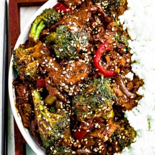 Close up overhead photo of a plate of soy curl beef and broccoli with white rice